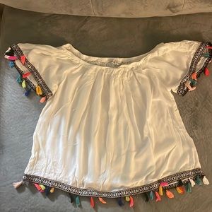 Flare shirt with colorful pom pom detailing
